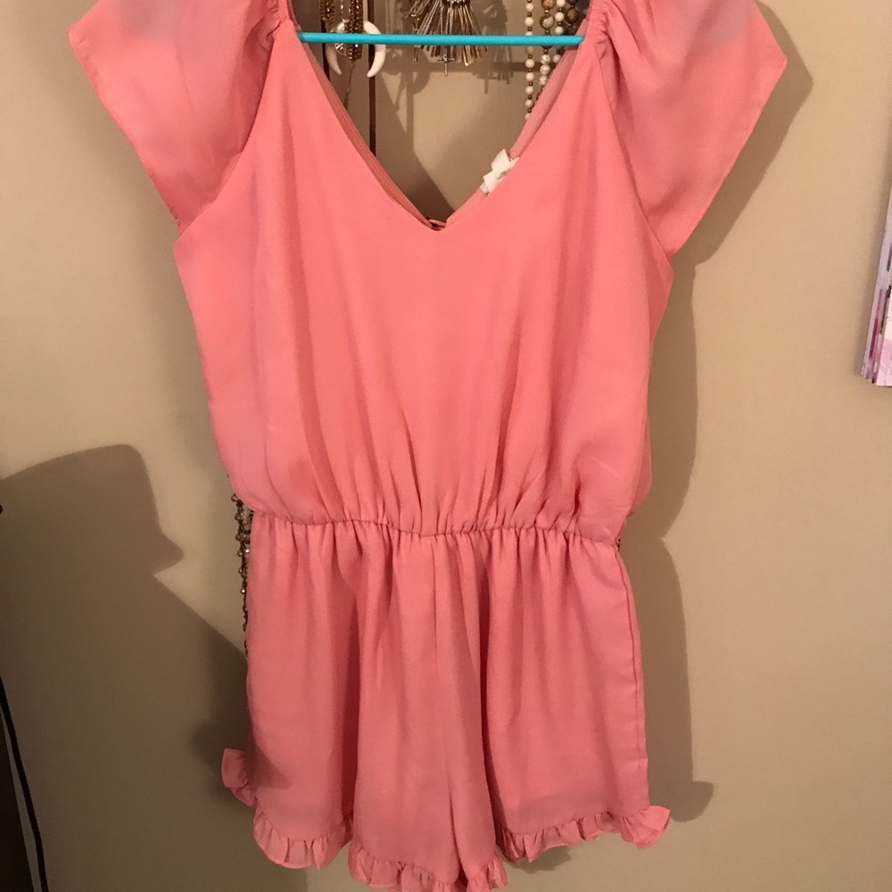 Light pink ruffle romper